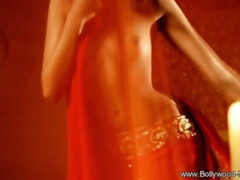 A daring Indian Lady dancing with a seductive way of showing her naked body