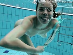 podvodkova swimming in blue bikini in the pool