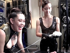 A gimp is tortured and milked by two dominant ladies