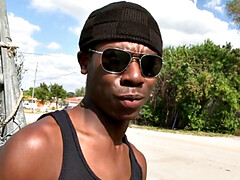 Amateur pornstar deepthroats white dude's cock for cash in the great outdoors