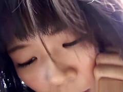 Asian whore rides dildo