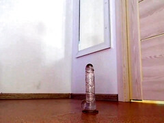 Amateur young brunette with perky tits sucking dildo on her forth - solo