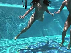 Lindsey Cruz and Jessica Lincoln entertain each other