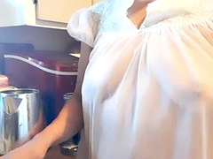 Mature woman in sheer granny nightgown, natural tits