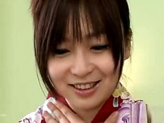 Cute asian sits on large dildo