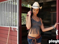 Sexy ebony MILF posing on the ranch