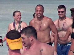 Group of college babes showing their tits at the beach