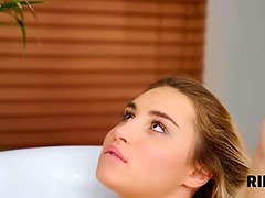 Hot bath made the charmer eager to give her hubby sex