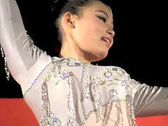 Super pretty Chinese girl with lovely bod performing a death failing to obey acrobat