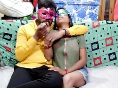 Indian husband making a nice show with the masked wife
