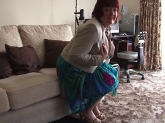 Naughty housewife getting herself wet