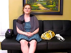 Redheaded babe is going to use a toy to keep herself wetter