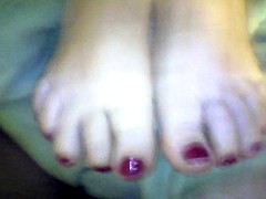 footjob wife red toenails