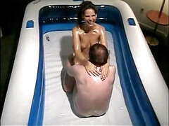 Oily threesome with two younger girls