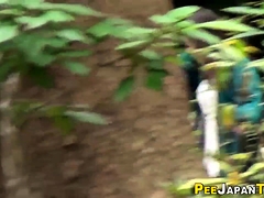 Asian teens urinating