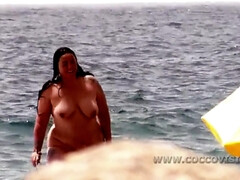 Naked MILFs on the beach - voyeur video