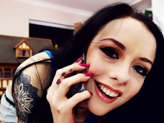 Tattooed brunette is making a porn video
