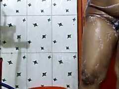 Indian desi cougar step-mother bathing MMS voyeur camera real wifey