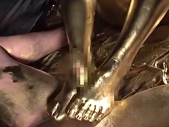 strange japanese gold fetish with hot babe giving footjob
