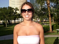Shameless chick shows off her nice big boobs outdoors