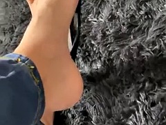 Cute teen enjoys foot fetish