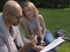 Lovely teen Olivia Devine munches on a big cock