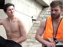 This old slut is so horny she sucks 2 construction workers at once