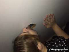 Amateur teen sucking a fat cock through a glory hole