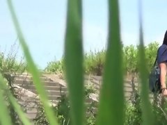 Teens peeing in field