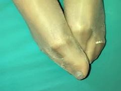 Nylon footjob with polished silver nails and toes