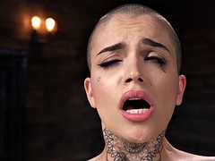 leigh raven is tattooed tied up and machine fucked